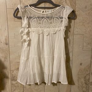 Shirt from Francesca’s. White with lace and ruffle detailing. Size large.